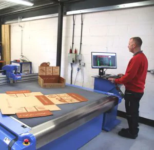 Jason Smithers setting up the DYSS at Smart Packaging